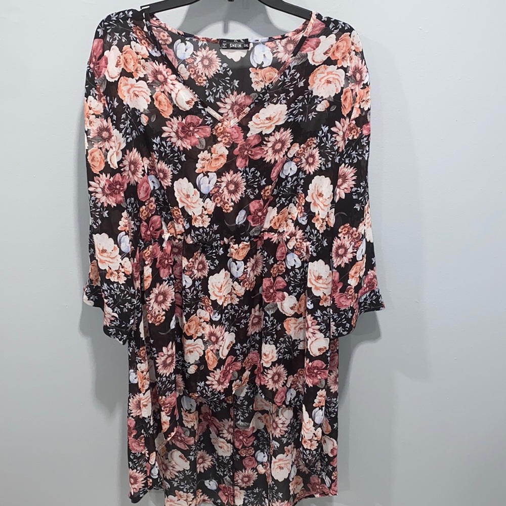 Floral high low 3/4 sleeve v neck top